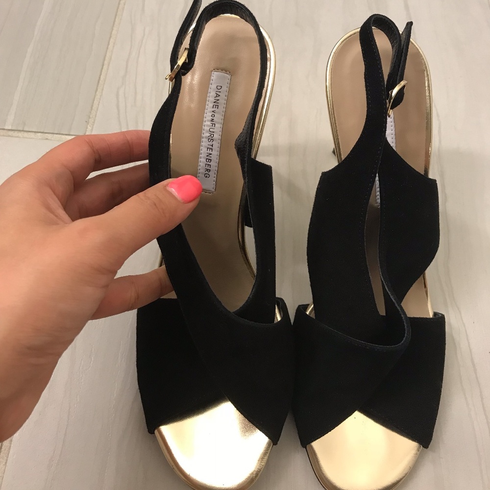 Diane Von Furstenberg black and gold criss cross